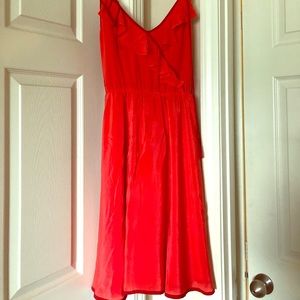 Beautiful red dress with flowy accents